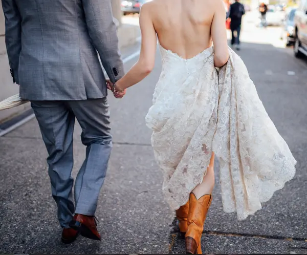 Bride and groom on paved path at outdoor Washington wedding. Lovely Events.